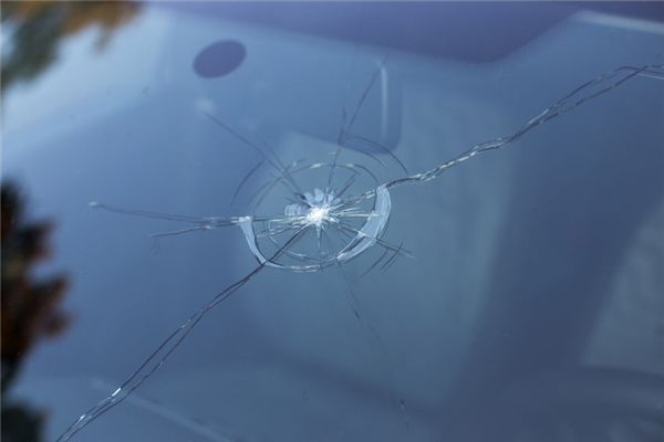 If a Rock Flies Off a Passing Truck, Can You Hold Them Accountable for Windshield Repair?