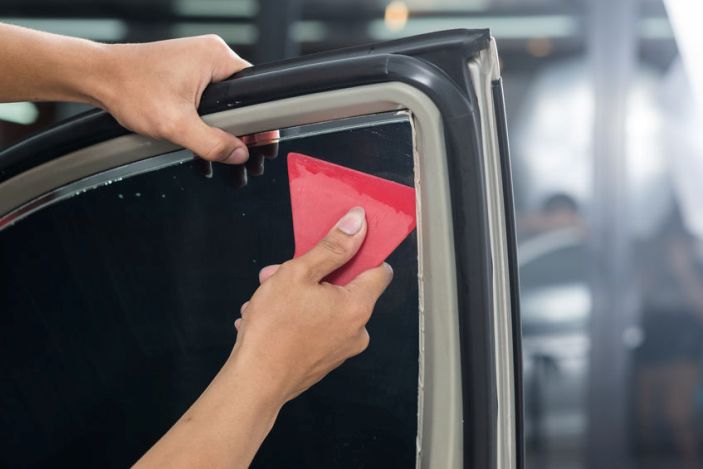How Does Auto Glass Repair Work With Tinted Windows?